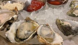 Shuckers Oyster Bar - a group of oysters on ice