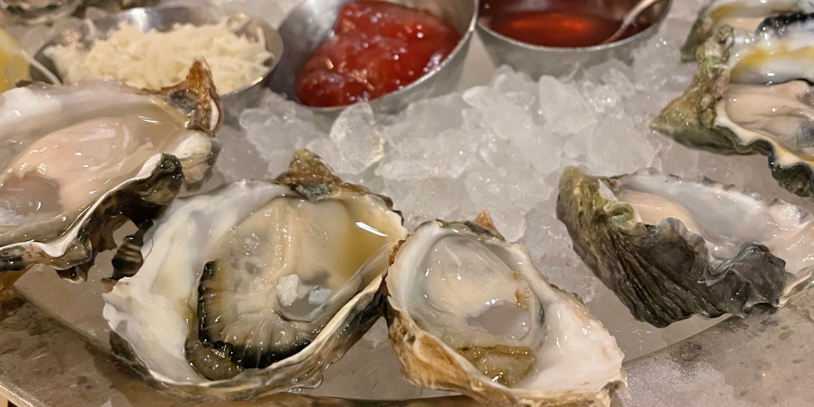 Shuckers Oyster Bar - a group of oysters on ice