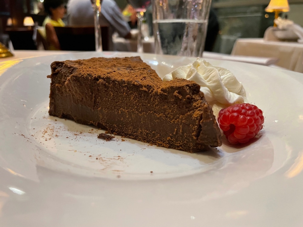 chocolate cake with raspberry and whipped cream