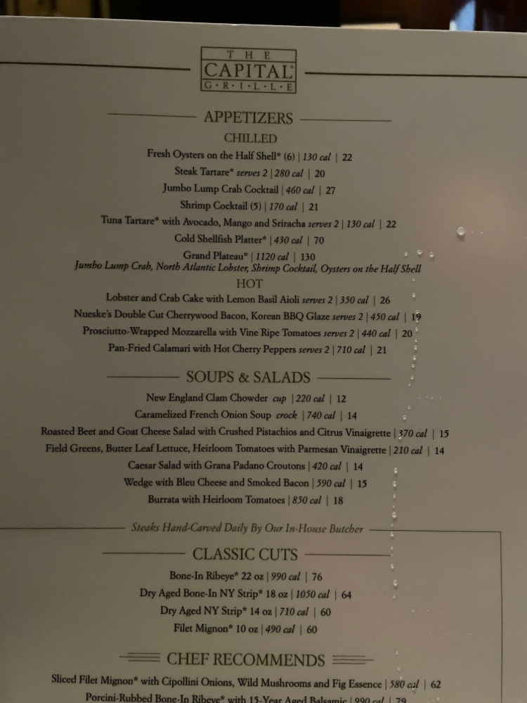 appetizer and salads listed on a menu from a traditional steakhouse