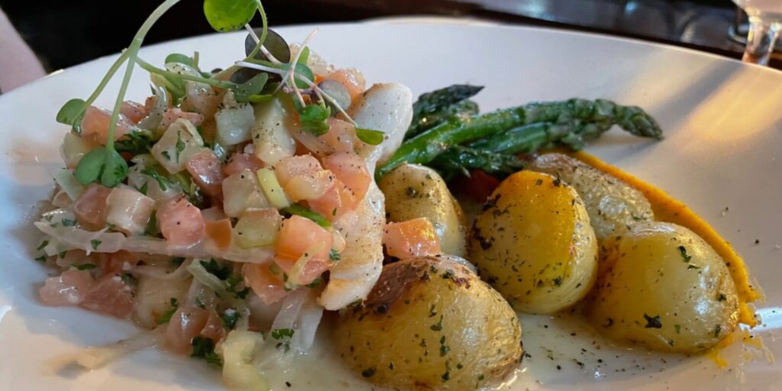 halibut cheeks with citrus salad, asparagus and new potatoes