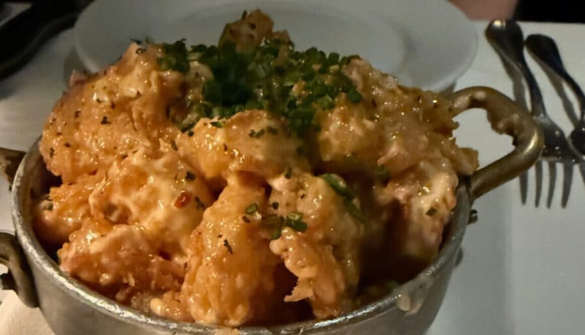 breaded shrimp appetizer served in a metal pot