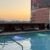 rooftop pool overlooking phoenix skyline