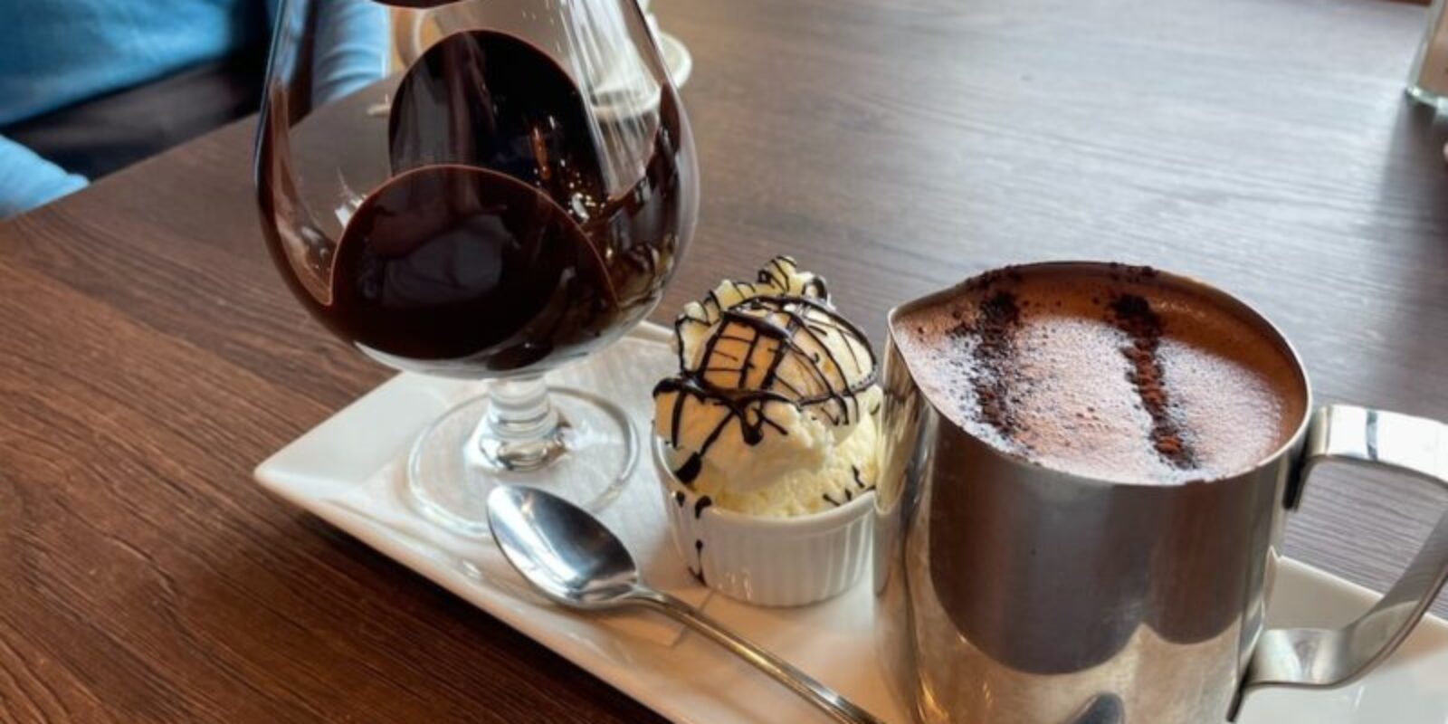 Melted chocolate with hot chocolate on the side