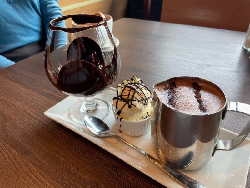Melted chocolate with hot chocolate on the side