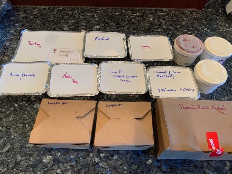 Takeout items packaged and labeled with reheating instructions