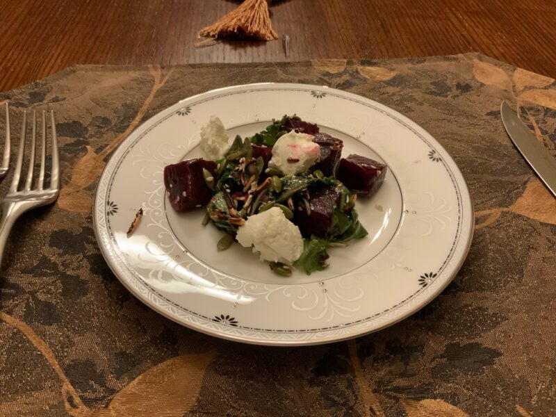 Peasant Beet Salad with beets, puffed wild rice, seeds, caramelized honey vinaigrette and goat mousse